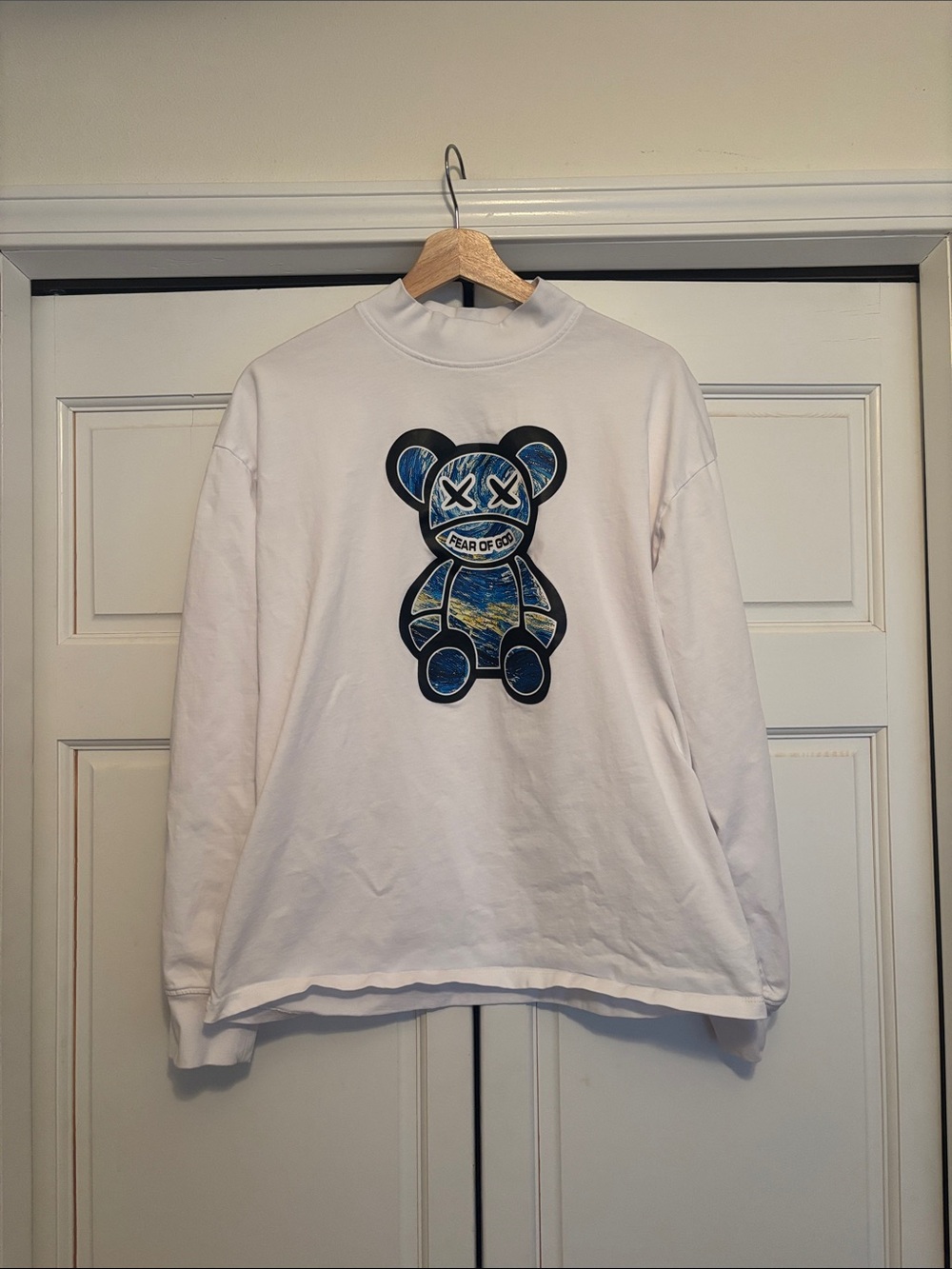 Fear of God teddy bear logo featuring a Starry Night pattern on the fron